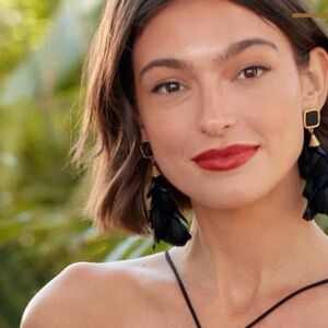 Parades statement goose feather  earrings